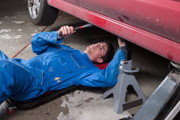 Working On Car In Garage