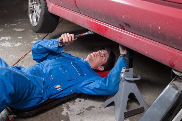 Working On Car In Garage