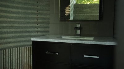 You Can't Turn That into a House - Grain Silo with Radiant Panel bathroom