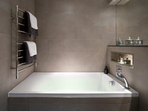 Lifestyle Stock Photo Modernized Bathroom and Towel Warmer Combo