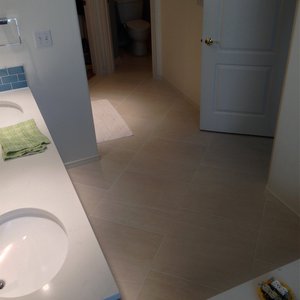 After installing WarmlyYours in-floor heating in his master bathroom, Kory Nelson began planning to add it to all of the homes he was remodeling.