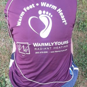 WarmlyYours team all sported matching merlot t-shirts reading, Warm Feet, Warm Hearts.