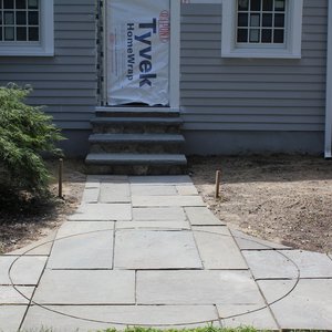 ”Robillard installed warmlyyours snow melting cable under a decorative bluestone walkway outside home in concord mass.