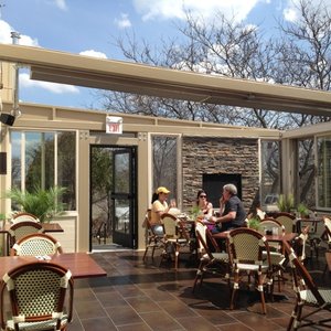 The retractable glass roof created a beautiful indoor-outdoor dining area, but heat loss is a real problem. The WarmlyYours TempZone floor heating system helps keep the room warm year-round.