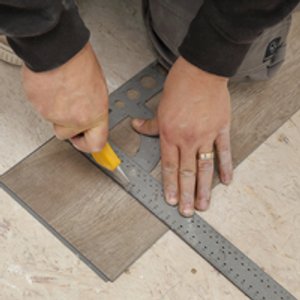 Cutting planks to size is simple with a utility knife
