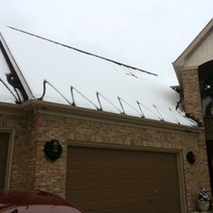 A WarmlyYours roof and gutter deicing system keeps veterans safe.