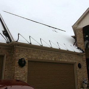 WarmlyYours donated a roof and gutter de-icing system to Tee Shirts 4 Troops.