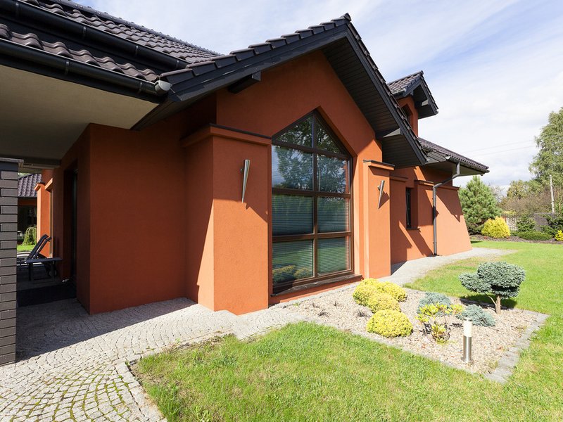 Passive solar design includes windows with southern exposure and overhangs to optimize the use of the sun's energy in summer and winter.